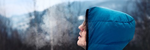 man-breathing-in-cold-air